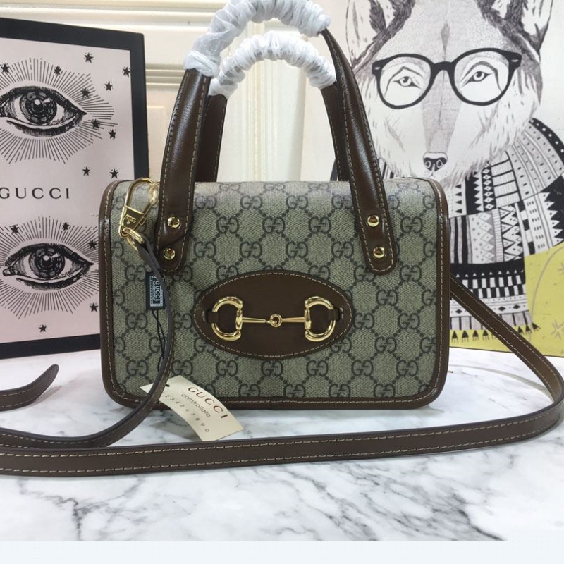 G*u*i top handle bags